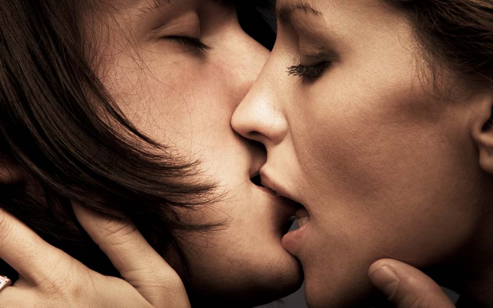 couple passionately kissing